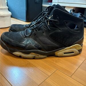 Jordan Black and Gold Sneakers with Air Cushioning